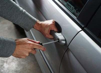 Car Theft - Door lock being picked.
